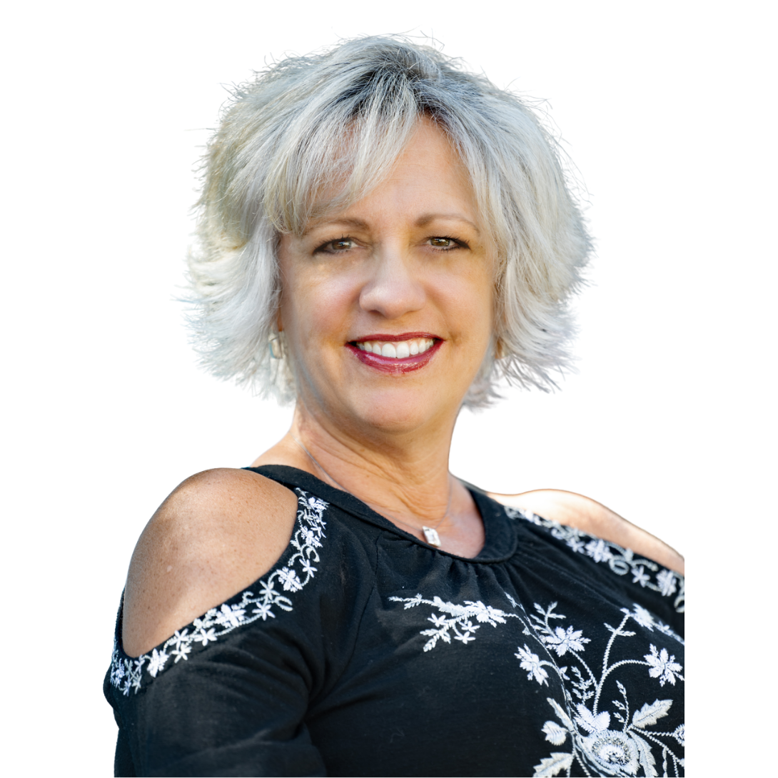 Jena Taylor, resiliency coach, wearing black and white embroidered top