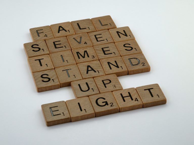 what does it mean to be resilient? Image that says: Fall seven times stand up eight.