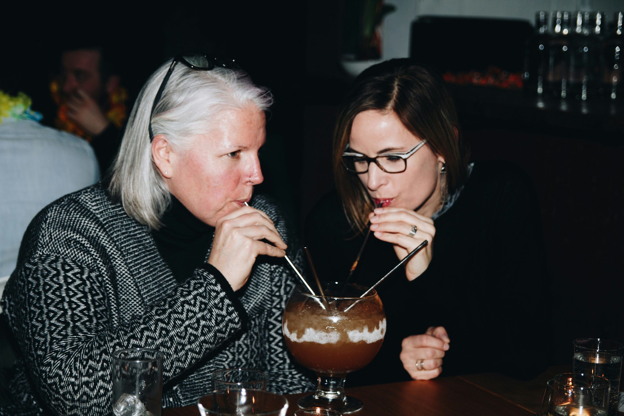 examples of resilience: two women sharing a cocktail